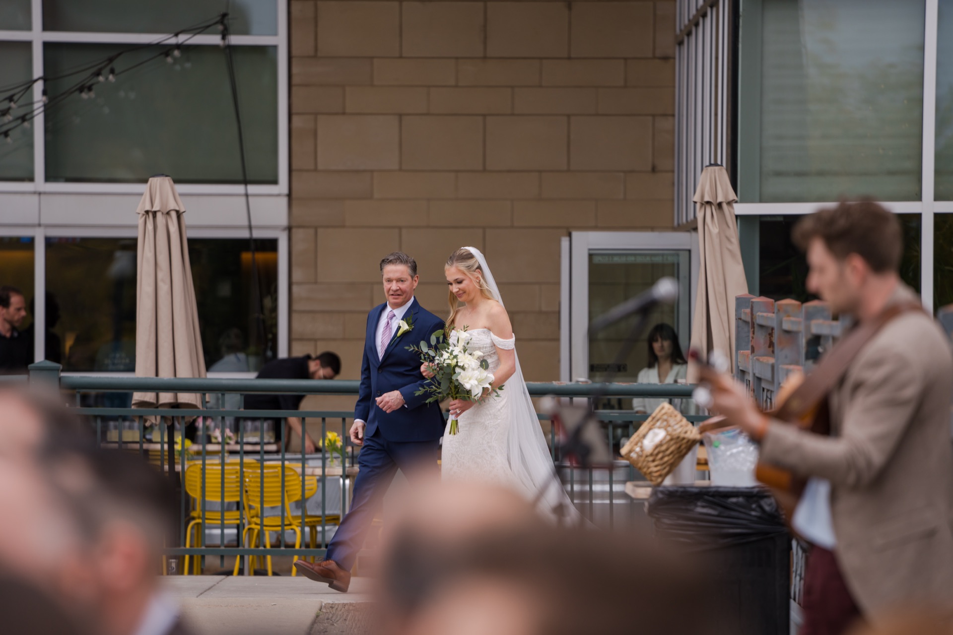 Denver wedding guitarist Jordan Lovinger performing live acoustic guitar at Coohills wedding ceremony in Colorado